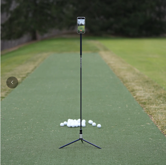 gpd stand holing an iPhone on a golf putting course displaying coachnow